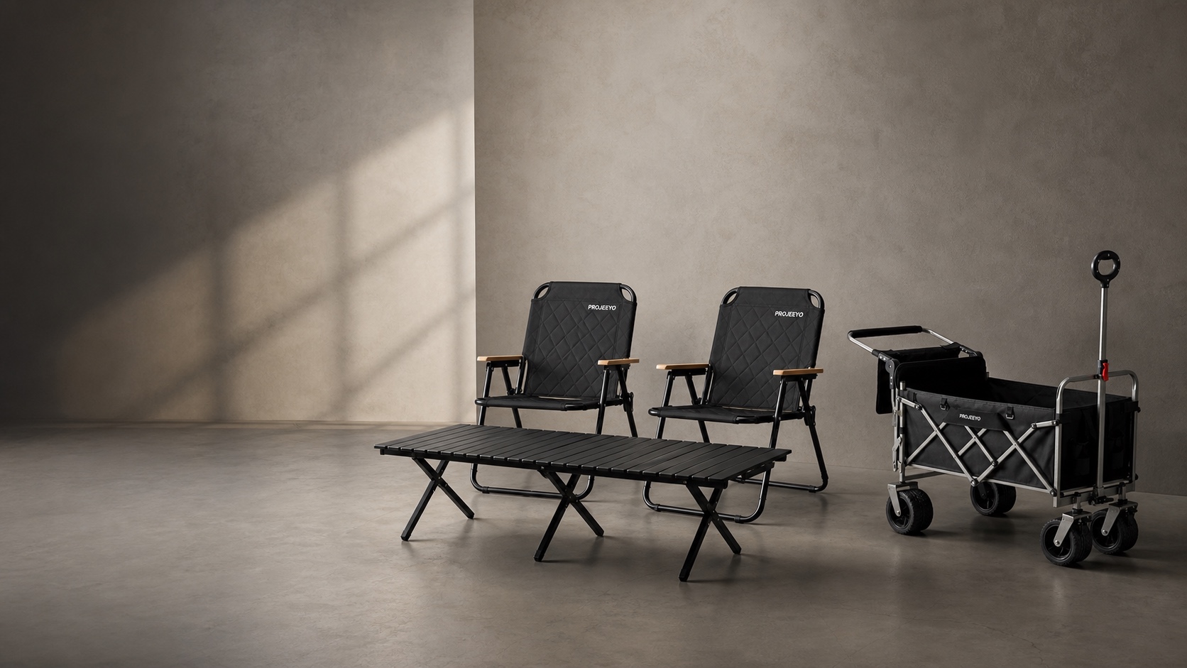 Black PROJEEYO outdoor equipment in a warm grey studio